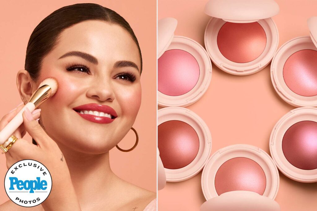 Close-up of a hand holding a compact of Rare Beauty highlighter, showcasing its radiant glow and sleek packaging.